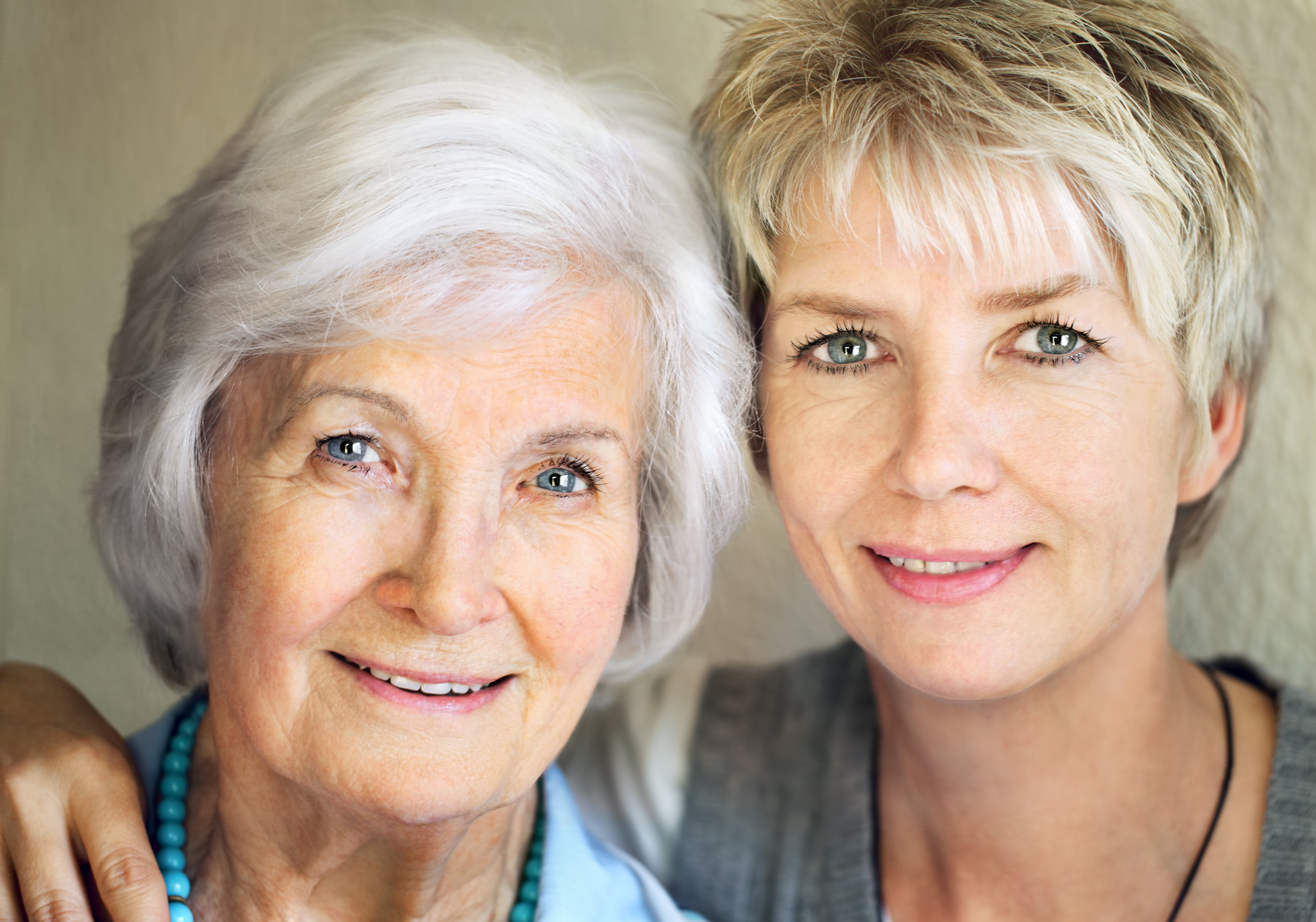 Senior mother and mature daughter portrait, 25 years between them